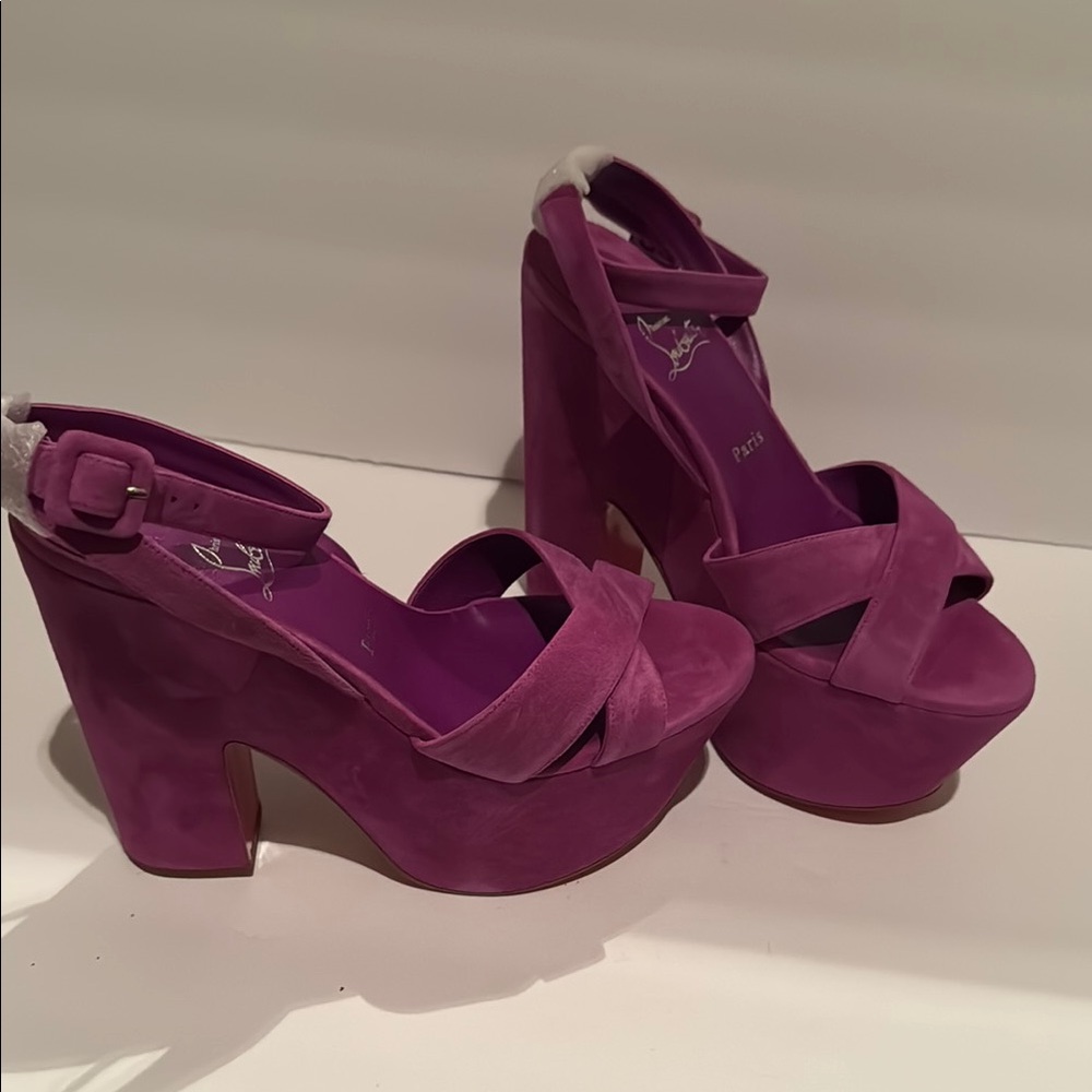 Brand New. Never worn. Christian Louboutin Purple Platform Sandals